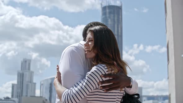 Happy African Businessman Greeting Female Colleague alt