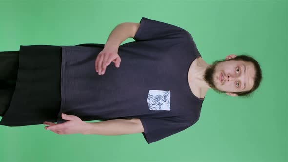 The Unpleasantly Shocked Man Covers His Mouth with His Hand and Shows Disgust By Shaking His Head alt