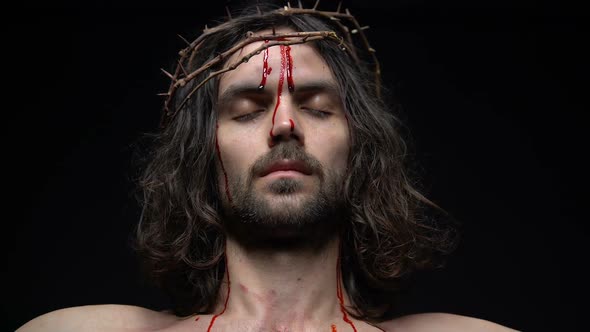 Crucified Jesus With Crown of Thorns Bleeding, Redeeming People Sins, Kindness alt