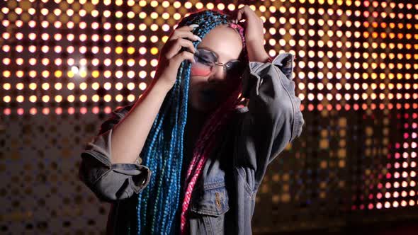 Girl Is Touching Up Her Hair alt