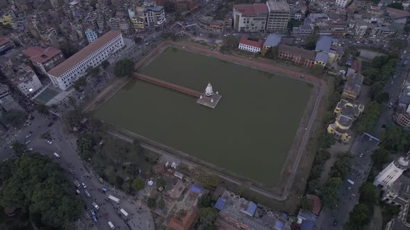 Looking down at the Queens Pond from aerial view in Nepal alt