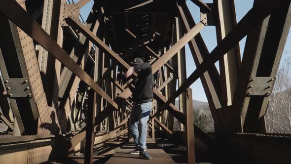 Modern dance on a railway bridge alt