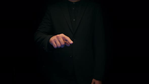 Business Man Posing over Black Background Showing Gesture