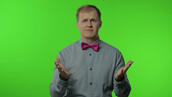 Why Question. Upset Man Raising Hands in Indignant Expression, Quarreling, Asking Reason of Conflict alt