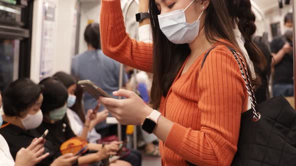 Young asian woman cover mouth , wear medical face mask to protect viruses alt