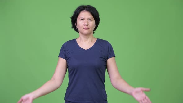 Beautiful Woman Covering Eyes As Three Wise Monkeys Concept alt