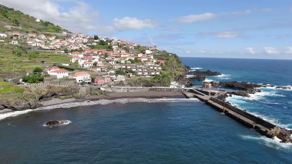 Aerial view of Seixal black sand volcanic beach, Madeira, Portugal alt