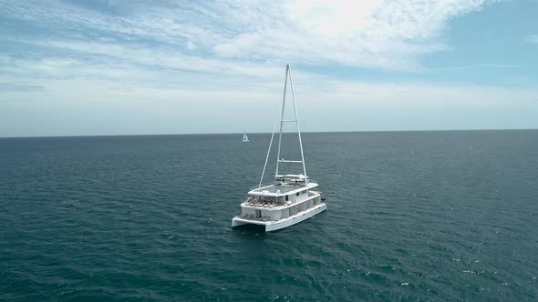 Rotational Shot around a Large Catamaran Yacht alt