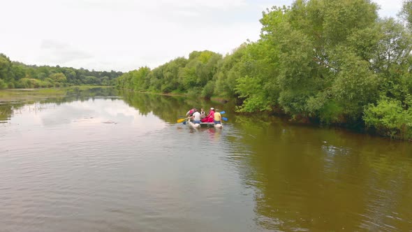 Flying over beautiful river and catamaran with tourists alt