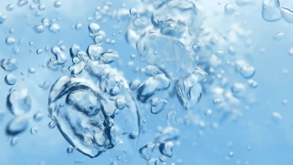 Bubbles Rising Up at Surface in a Pure Blue Water alt