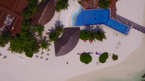 Aerial seascape of exotic coastline beach by blue lagoon and sand background alt