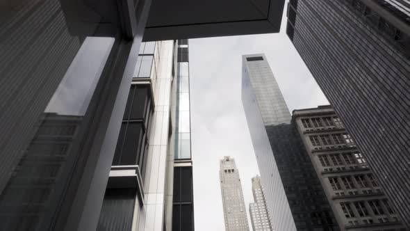 New York Manhattan. Low Angle View of Modern Skyscrapers and Towers, Slow Motion alt