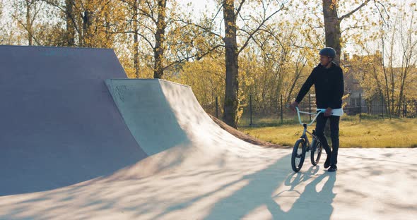 The Best Skater in Town Walks Into Park on Ramps Walks Through Middle of Square alt