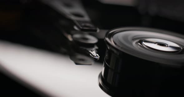 Computer components. HDD Hard Disk Drive in work. plate rotation spin. Digital technology concept alt