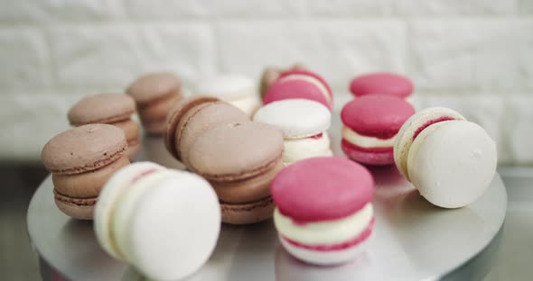 Cooking Confectionery And Baking Concept Colorful Red White And Caramel Macarons alt