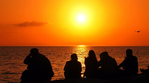 People Silhouette In Sunset 1