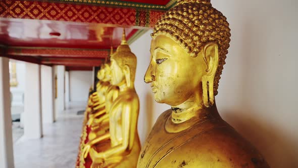 Close Up Gold Leaf Buddha Statues in Bangkok, Thailand at Buddhist Temple, Buddhist Statues Portrait alt