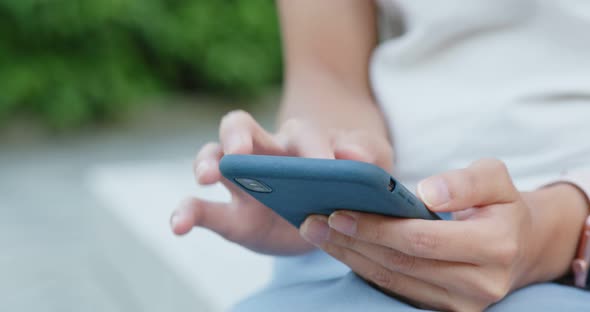 Woman use of smart phone alt