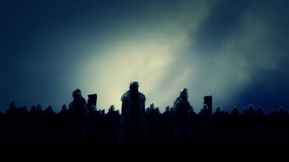 King And His Army Standing In A Battlefield alt