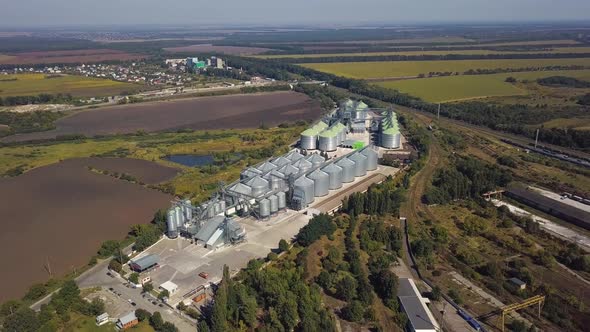 Aerial View of Agricultural Land and Grain Silo alt