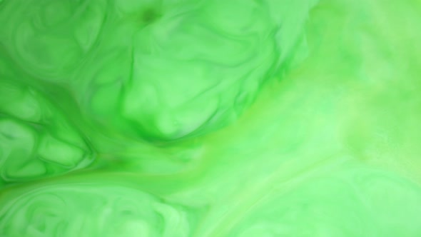  Footage. Ink in Water. Green Ink Reacting in Water Creating Abstract Background