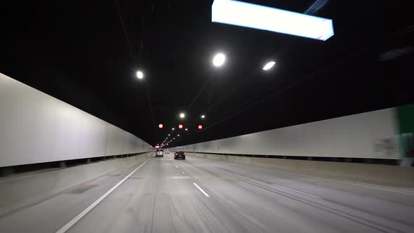 Driving in Traffic Through an Underground Road Tunnel