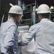 Engineers Discussing Blueprint in Factory - VideoHive Item for Sale
