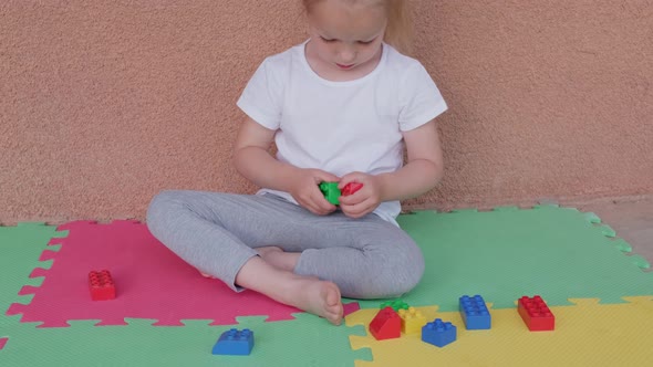 Toddler Little Girl Taking Apart Disassembling Leggo Constructor Bricks Toys