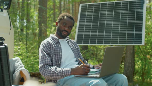 Ecologist Working On Laptop alt