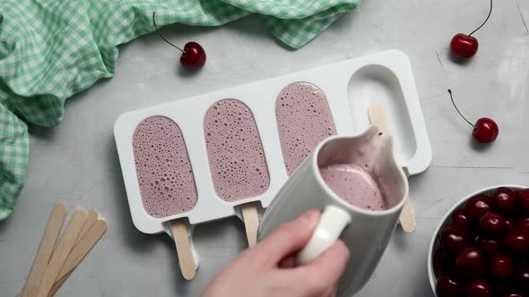 Making Homemade Cherry Popsicles alt