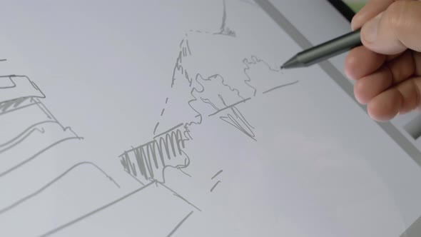 Mano de un diseñador dibuja en una tableta digital / 4K