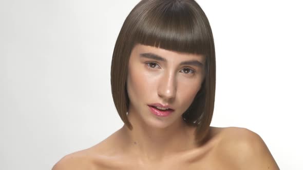 Fashionable Model with Short Hair Cut Smiling To Camera alt