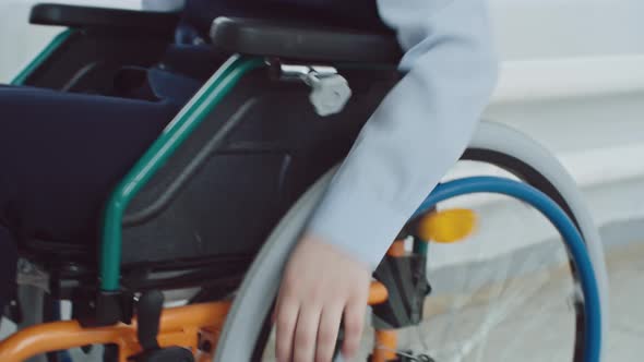Closeup of Schoolboy in Wheelchair alt