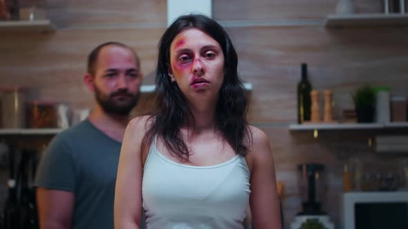 Man Covering the Woman's Mouth alt