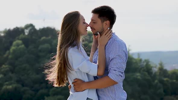 Couple In Love Hugging In Nature With Beautiful View alt