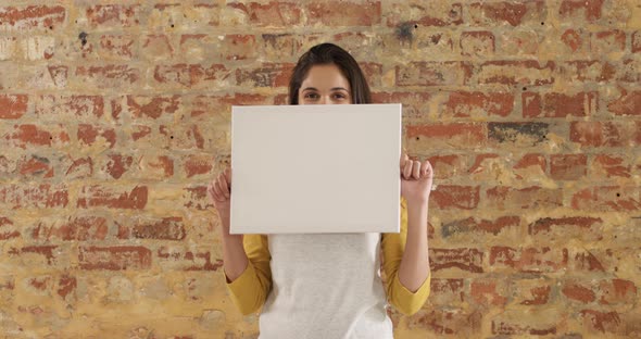 Happy Caucasian couple enjoying the pool during a sunny day alt