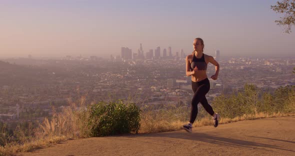 Fit Woman Jogging Los Angeles Slow-Motion alt