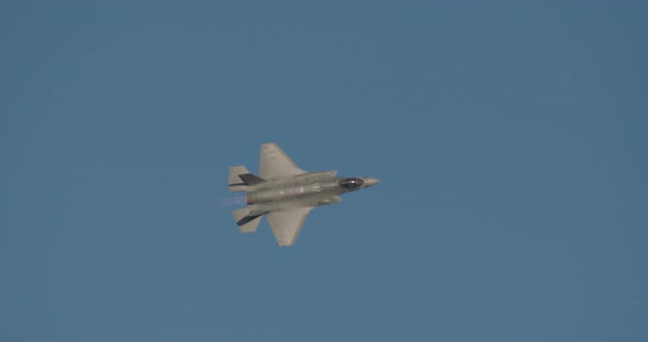 Israeli air force F-35 stealth fighter flying at high speed during an airshow alt