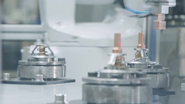 Advanced robotic machine manufacturing parts in an automated assembly line alt