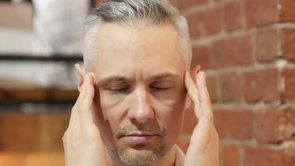 Headache, Upset Tense Middle Age Man Close Up alt