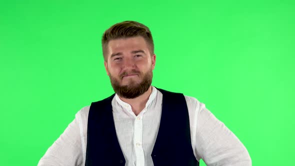Man Is Reporting and Tells a Lot of Interesting Informations. Green Screen alt