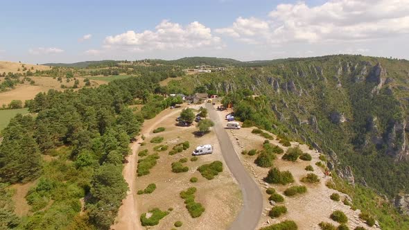 Aerial travel drone view of Gorges du Tarn and the Tarn River, Southern France. alt