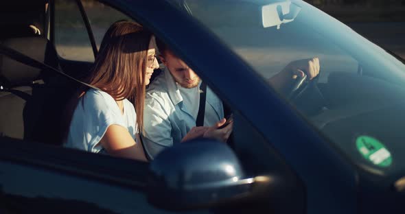 Couple in Car Navigation GPS