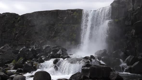 Oxararfoss waterfall located between two tectonic plates, Iceland (slow motion) alt