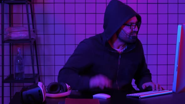 Gamer Cries Going Crazy of Defeat in the Video Game Hitting Table with His Fist alt