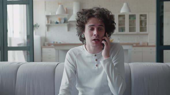 Hipster Calling a Person Arguing on the Phone in Home Living Room alt