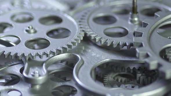 Set Of Grey Or Silver Rotating Gears alt