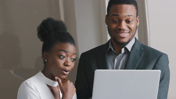 Focused Male Mentor Manager Instruct Female Trainee Consult Client Explain Computer Project alt