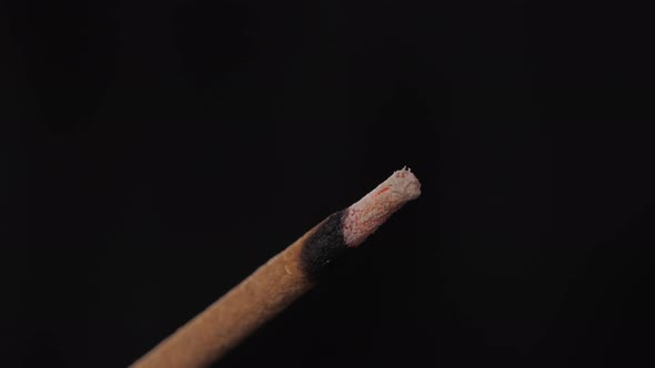 Incense Stick and Smoke From Incense Burning. Macro Close Up Lighter Fire and Beautiful Smoke. alt