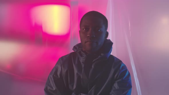 Portrait of African American Scientist Going Working in Secret Lab alt